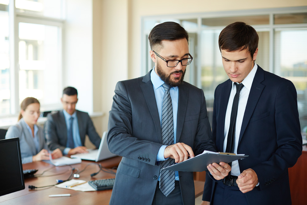 businessman showing changes report